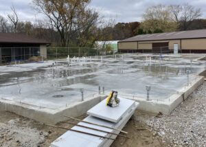 Self-preformed concrete slab